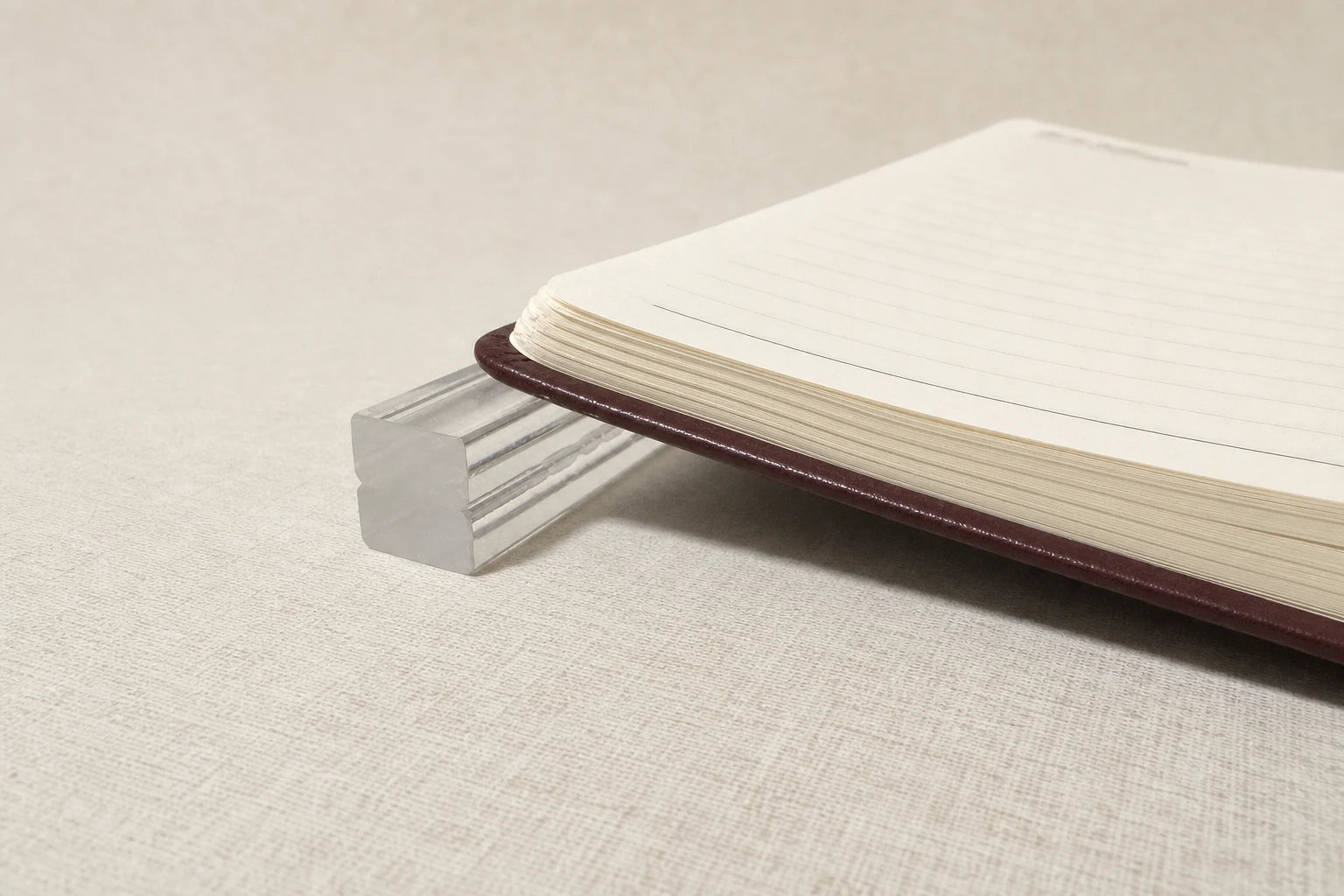 Two transparent Writing Supports stacked beneath the left cover during the later pages.
